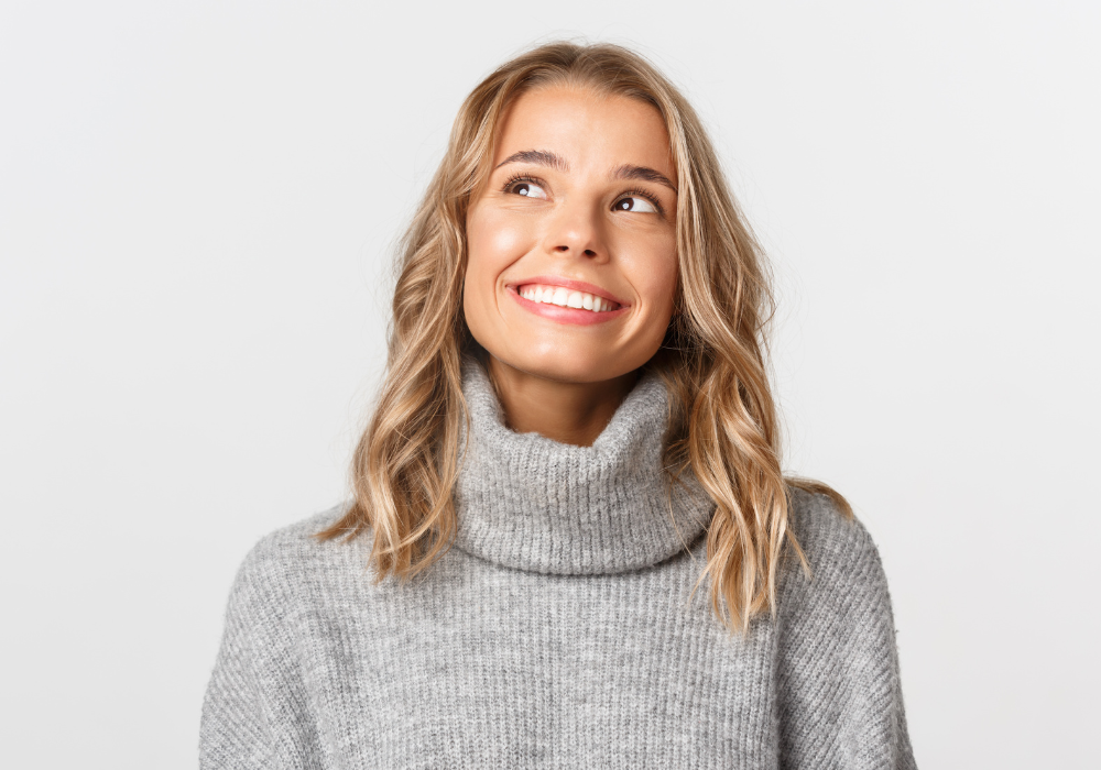 image of a girl smiling and looking up